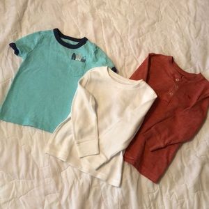 One short sleeved shirt, two long sleeved shirts